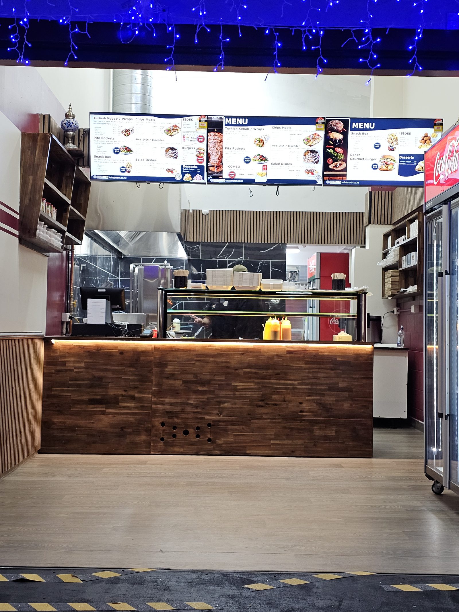 Finished takeaway shopfront with counter and menu boards